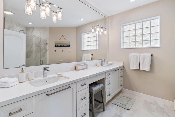 Bathroom, Dual Sink Vanities, Interior, Marble, Marble Walls, Recessed Lighting