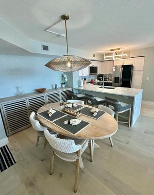 Dining room, Interior, Kitchen, Pendant Lights, Stainless Steel Appliances, Wood Texture Flooring