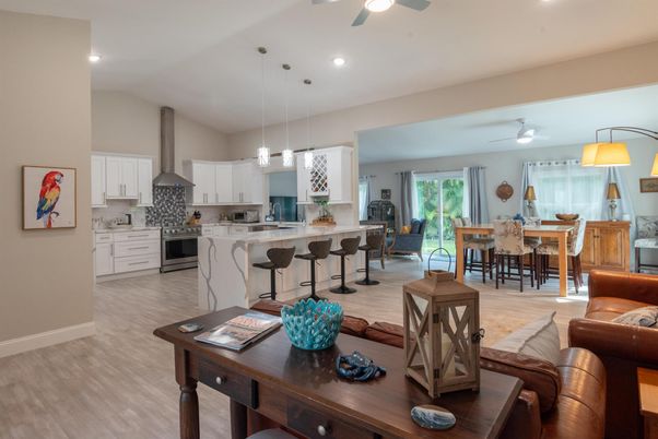 Dining room, Interior, Kitchen, Pendant Lights, Recessed Lighting, Stainless Steel Appliances, Wood Texture Flooring