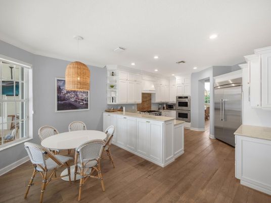 Dining room, Interior, Kitchen, Pendant Lights, Recessed Lighting, Stainless Steel Appliances, Wood Texture Flooring