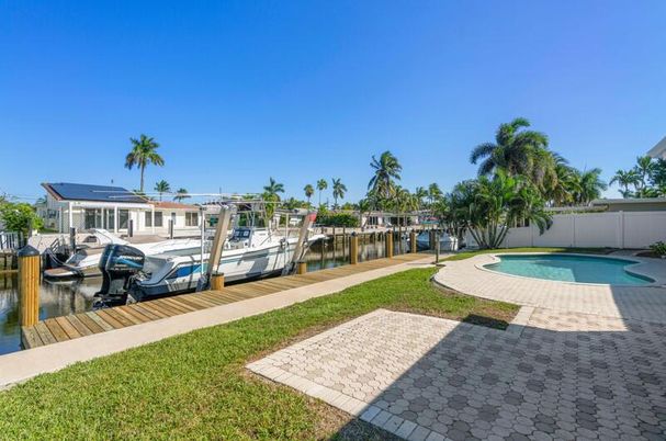 Exterior, Lake, Pool, Solar Panels