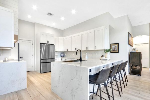 Interior, Kitchen, Marble Walls, Recessed Lighting, Stainless Steel Appliances, Wood Texture Flooring