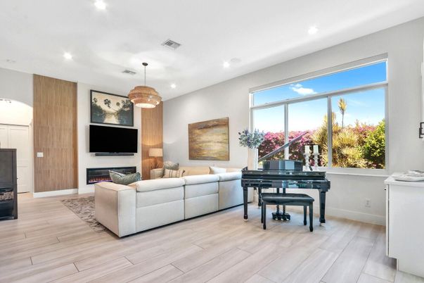 Fireplace, Interior, Living room, Pendant Lights, Piano, Recessed Lighting, Wood Texture Flooring