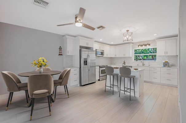 Dining room, Interior, Kitchen, Recessed Lighting, Stainless Steel Appliances, Wood Texture Flooring