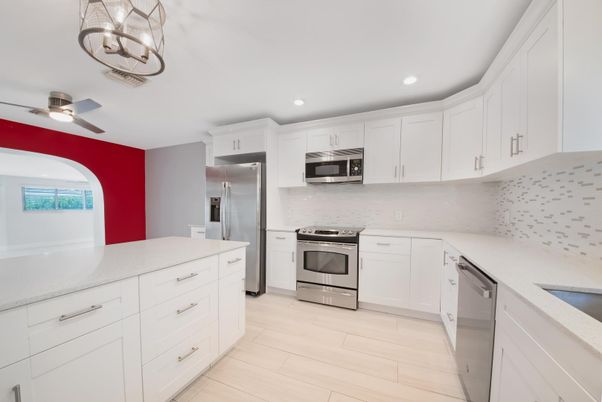 Interior, Kitchen, Recessed Lighting, Stainless Steel Appliances, Wood Texture Flooring