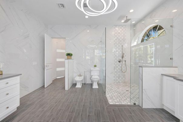 Bathroom, Glass Shower, Interior, Marble Walls, Pendant Lights, Recessed Lighting, Wood Texture Flooring