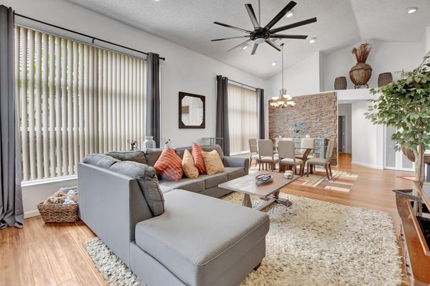 Chandelier, Dining room, Fireplace, Interior, Living room, Recessed Lighting, Stone Walls, Wood Texture Flooring