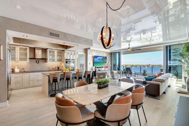 Dining room, Interior, Kitchen, Living room, Pendant Lights, Recessed Lighting, Stainless Steel Appliances, Water, Wood Texture Flooring