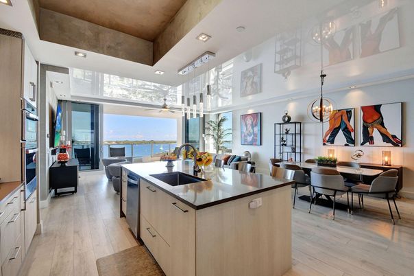 Chandelier, Dining room, Interior, Kitchen, Pendant Lights, Recessed Lighting, Water, Wood Texture Flooring