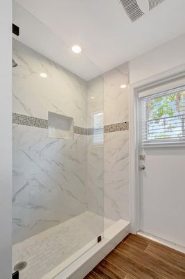 Bathroom, Glass Shower, Interior, Marble Walls, Recessed Lighting, Wood Texture Flooring
