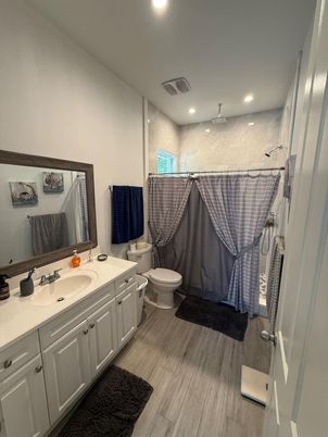 Bathroom, Dual Sink Vanities, Interior, Recessed Lighting, Wood Texture Flooring