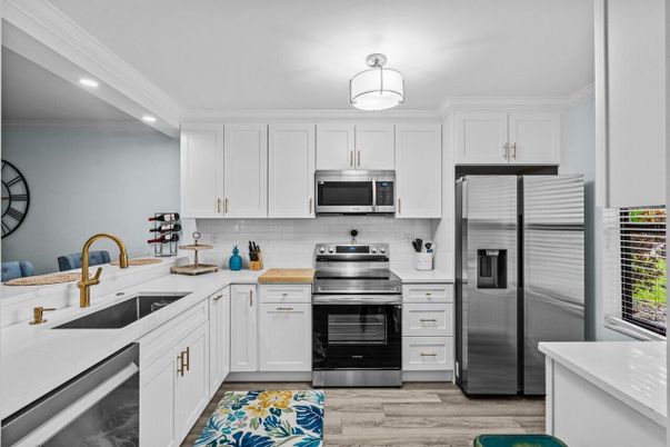 Interior, Kitchen, Recessed Lighting, Stainless Steel Appliances, Wood Texture Flooring