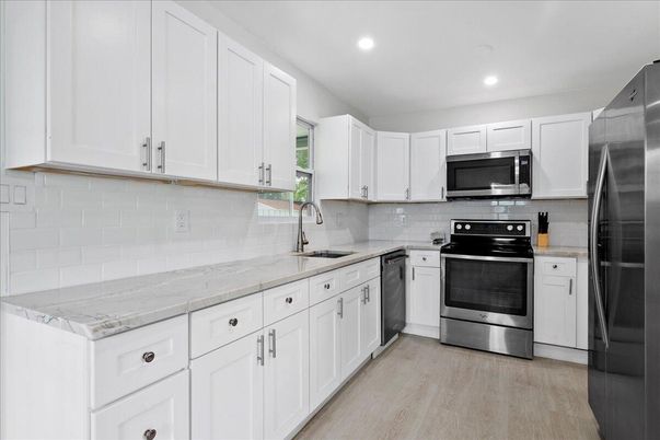Interior, Kitchen, Recessed Lighting, Stainless Steel Appliances, Wood Texture Flooring