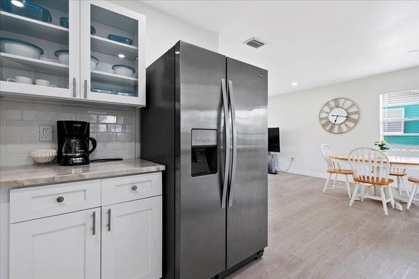 Dining room, Interior, Kitchen, Recessed Lighting, Stainless Steel Appliances, Wood Texture Flooring