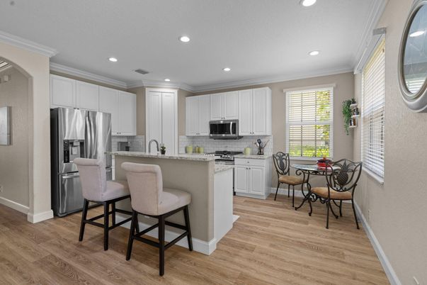 Dining room, Interior, Kitchen, Recessed Lighting, Stainless Steel Appliances, Wood Texture Flooring