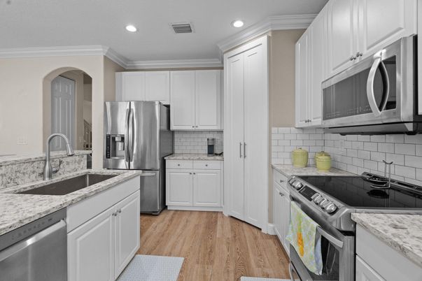 Interior, Kitchen, Recessed Lighting, Stainless Steel Appliances, Wood Texture Flooring