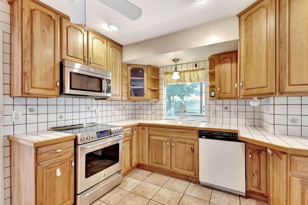 Interior, Kitchen, Pendant Lights, Recessed Lighting, Stainless Steel Appliances, Tile Countertops