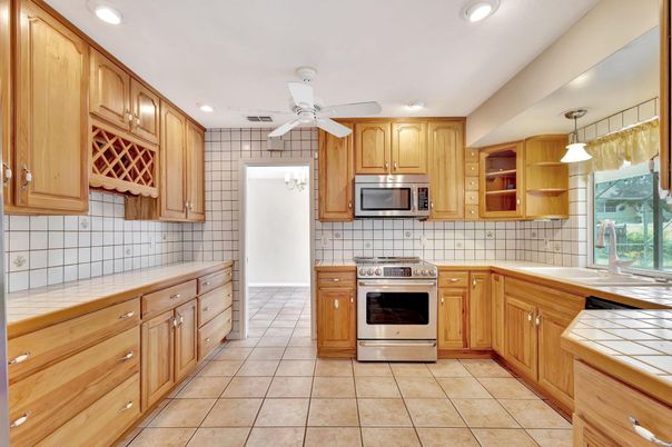 Interior, Kitchen, Pendant Lights, Recessed Lighting, Stainless Steel Appliances, Tile Countertops