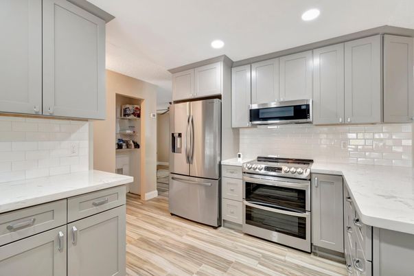 Interior, Kitchen, Recessed Lighting, Stainless Steel Appliances, Wood Texture Flooring