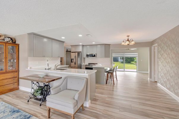 Chandelier, Interior, Kitchen, Recessed Lighting, Stainless Steel Appliances, Wood Texture Flooring