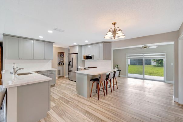 Chandelier, Interior, Kitchen, Recessed Lighting, Stainless Steel Appliances, Wood Texture Flooring