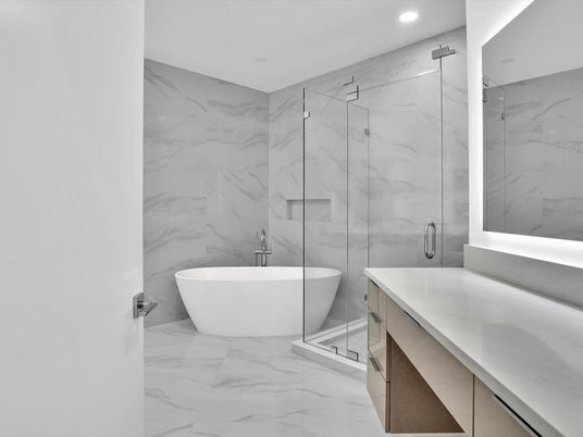Bathroom, Free Standing Baths, Glass Shower, Interior, Marble, Marble Walls, Recessed Lighting