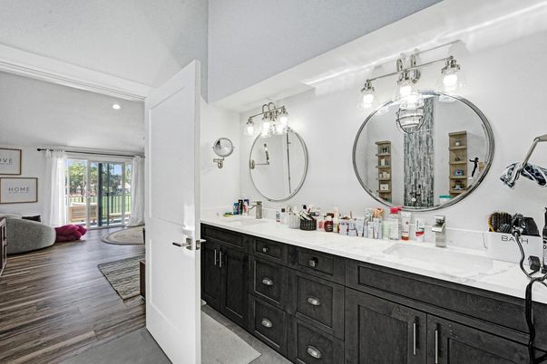 Bathroom, Dual Sink Vanities, Interior, Recessed Lighting, Wood Texture Flooring