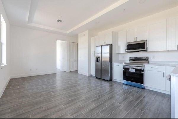 Interior, Kitchen, Recessed Lighting, Stainless Steel Appliances, Wood Texture Flooring