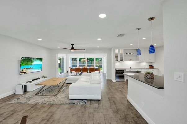 Dining room, Interior, Kitchen, Living room, Pendant Lights, Recessed Lighting, Stainless Steel Appliances, Wood Texture Flooring