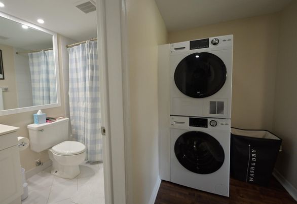Bathroom, Interior, Recessed Lighting, Utility Closets, Washer, Wood Texture Flooring