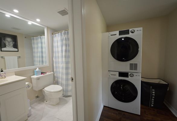 Bathroom, Interior, Recessed Lighting, Utility Closets, Washer, Wood Texture Flooring