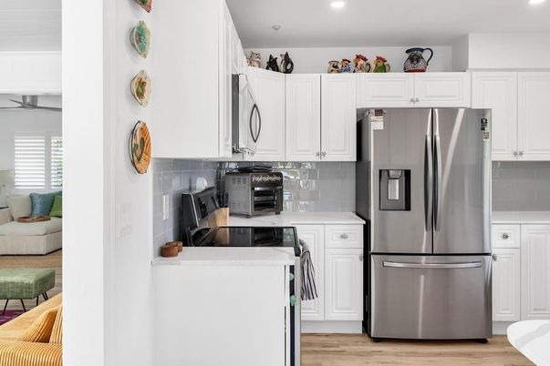 Interior, Kitchen, Recessed Lighting, Washer, Wood Texture Flooring