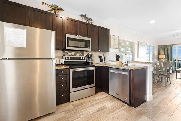 Dining room, Interior, Kitchen, Recessed Lighting, Stainless Steel Appliances, Wood Texture Flooring