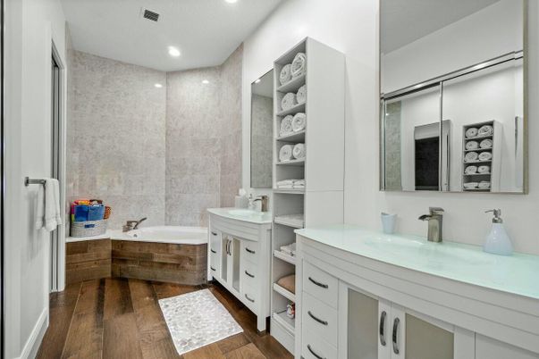 Bathroom, Dual Sink Vanities, Interior, Recessed Lighting, Wood Texture Flooring
