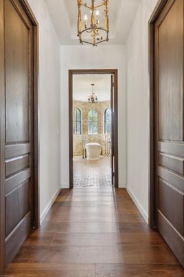 Bathroom, Chandelier, Free Standing Baths, Interior, Wood Texture Flooring