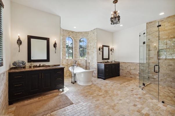 Bathroom, Dual Sink Vanities, Free Standing Baths, Glass Shower, Interior, Pendant Lights, Recessed Lighting, Stone Walls