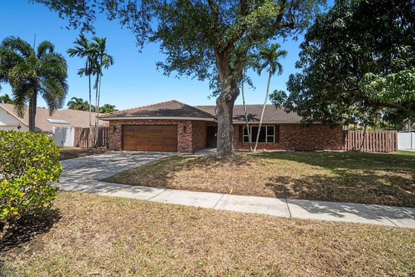 Attached, Backyard, Exterior, Facade, Brick Facade, Mediterranean