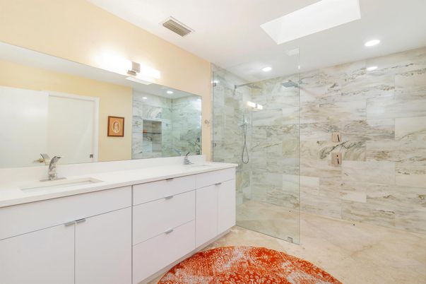Bathroom, Dual Sink Vanities, Glass Shower, Interior, Marble Walls, Recessed Lighting