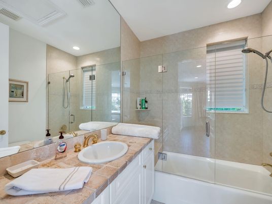 Bathroom, Dual Sink Vanities, Glass Shower, Interior, Recessed Lighting, Tile Countertops