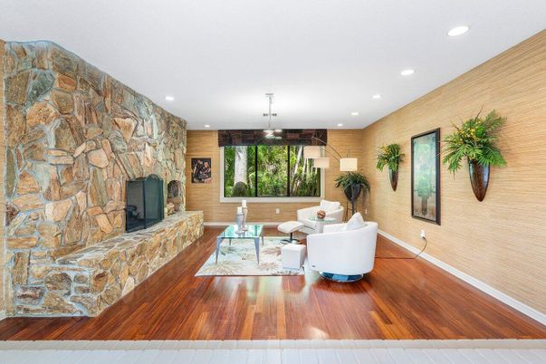 Fireplace, Interior, Living room, Recessed Lighting, Stone Walls, Wood Texture Flooring