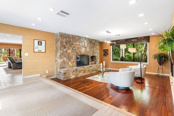 Fireplace, Interior, Living room, Pendant Lights, Recessed Lighting, Stone Walls, Wood Texture Flooring