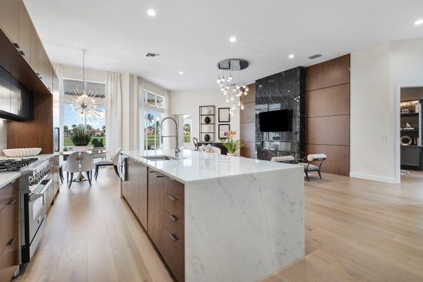 Dining room, Fireplace, Interior, Kitchen, Pendant Lights, Recessed Lighting, Stainless Steel Appliances, Wood Texture Flooring