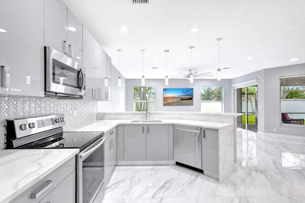 Interior, Kitchen, Marble, Pendant Lights, Recessed Lighting, Stainless Steel Appliances