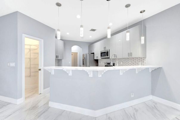 Interior, Kitchen, Marble, Pendant Lights, Recessed Lighting, Stainless Steel Appliances