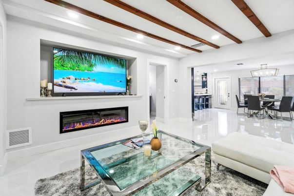 Chandelier, Dining room, Fireplace, Interior, Living room, Pendant Lights, Recessed Lighting, Wooden Beams