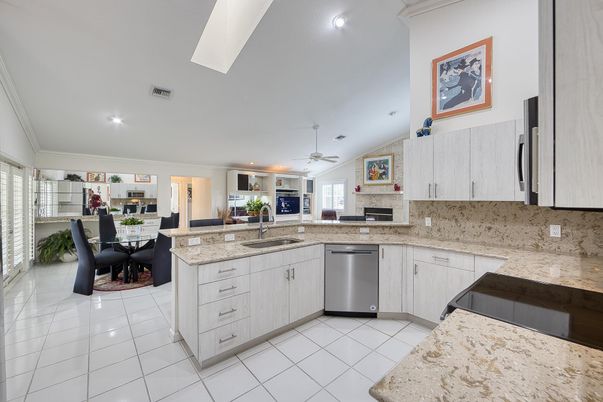 Dining room, Fireplace, Interior, Kitchen, Recessed Lighting, Stainless Steel Appliances