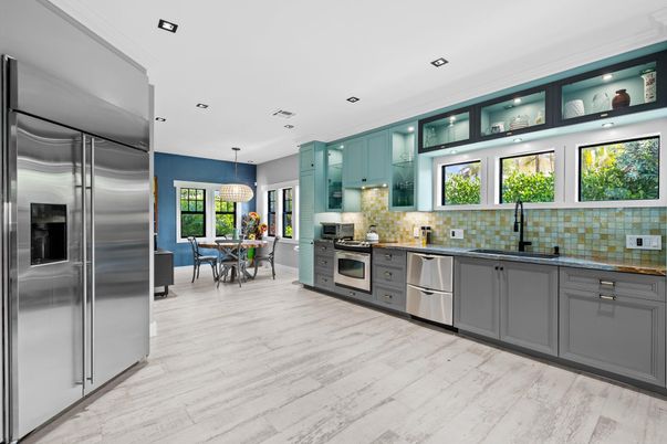 Dining room, Interior, Kitchen, Pendant Lights, Recessed Lighting, Stainless Steel Appliances, Wood Texture Flooring