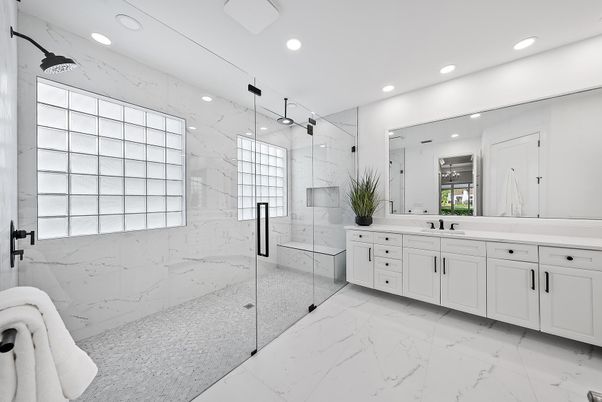 Bathroom, Dual Sink Vanities, Glass Shower, Interior, Marble, Marble Walls, Recessed Lighting