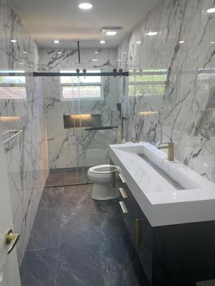 Bathroom, Dual Sink Vanities, Glass Shower, Interior, Marble, Marble Walls, Recessed Lighting