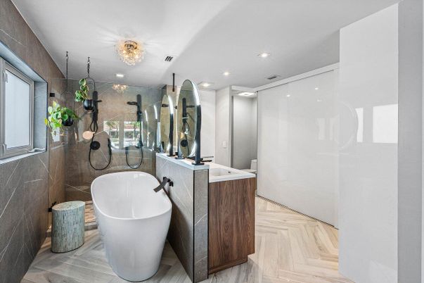 Bathroom, Chandelier, Free Standing Baths, Glass Shower, Interior, Recessed Lighting, Wood Texture Flooring